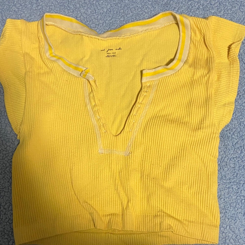 Yellow button up top